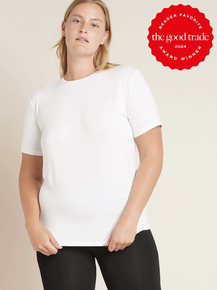 A model wearing a white crew t-shirt from Boody. The TGT 2024 Award Winner Badge is on the right corner of the image.