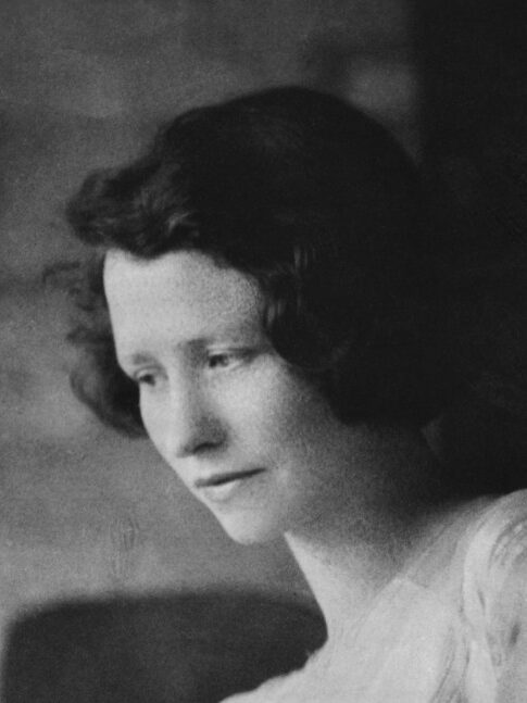 A black and white portrait of Edna St. Vincent Millay.