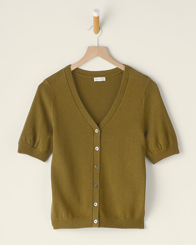 Olive green cardigan with short sleeves on a hanger.
