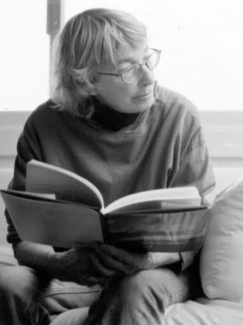 A black and white portrait of Mary Oliver.