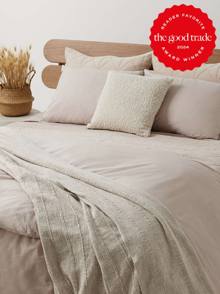 Beige and light pink Pact bed sheets. The TGT 2024 Award Winner Badge is on the right corner of the image. 
