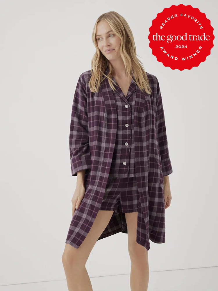 A model wearing Pact's Fireside Flannel robe in purple. The TGT 2024 Award Winner Badge is on the right corner of the image. 