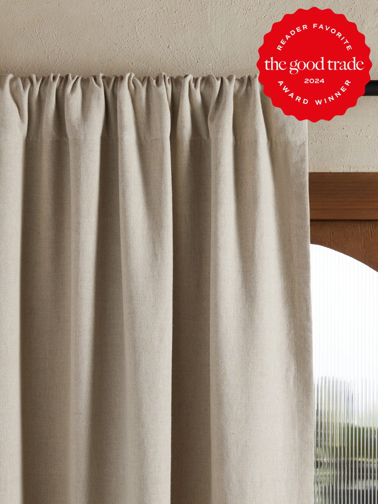 Beige linen curtains from Parachute. The TGT 2024 Award Winner Badge is on the right corner of the image. 
