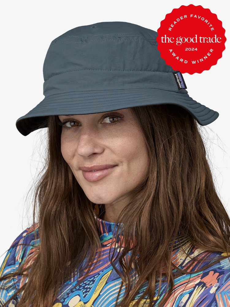 A model in a Patagonia teal bucket hat. The TGT 2024 Award Winner Badge is on the right corner of the image.