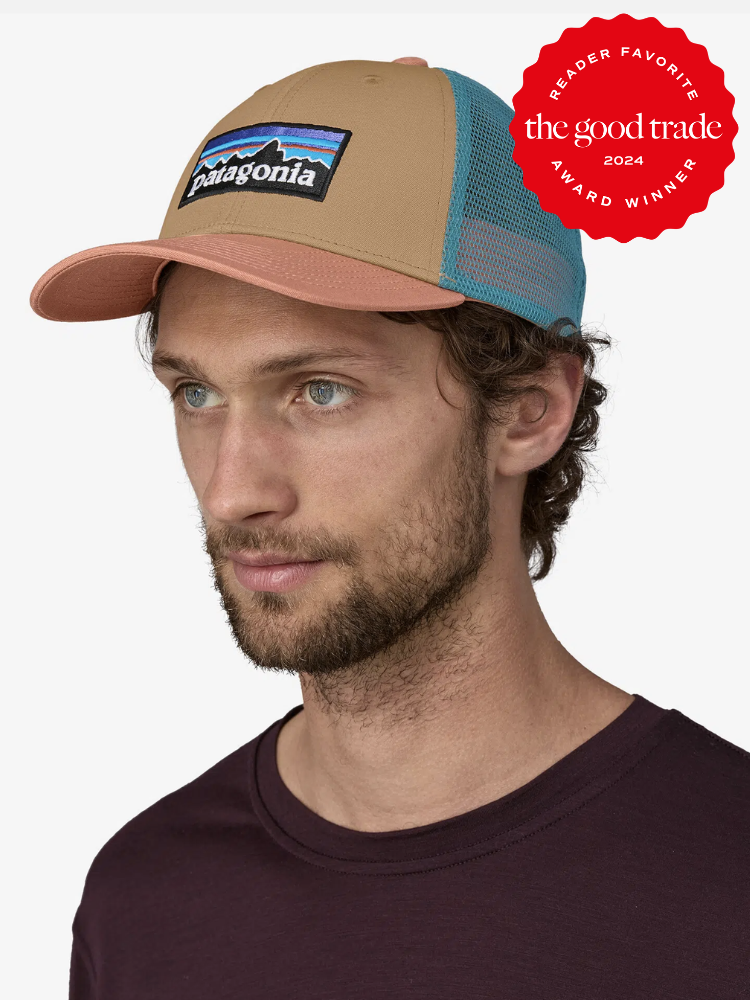 A model wearing a Patagonia Trucker Hat. The TGT 2024 Award Winner Badge is on the right corner of the image. 