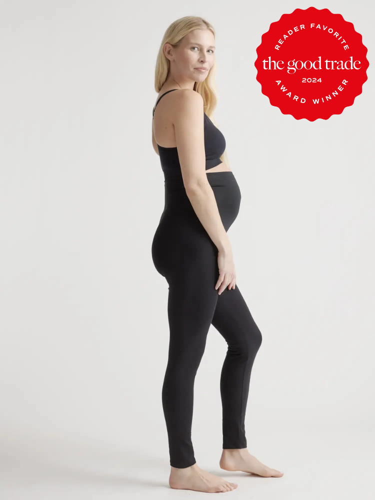 A model wears black maternity cotton leggings from Quince. The TGT 2024 Award Winner Badge is on the right corner of the image.
