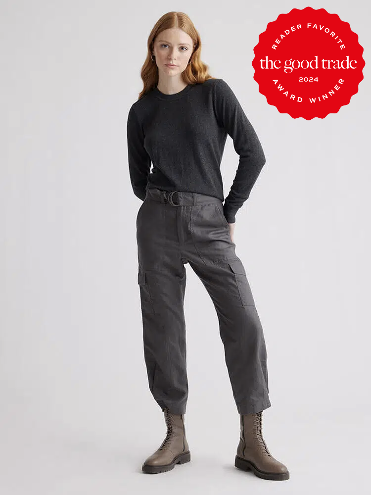A model wearing dark grey cargo pants from Quince. The TGT 2024 Award Winner Badge is on the right corner of the image.