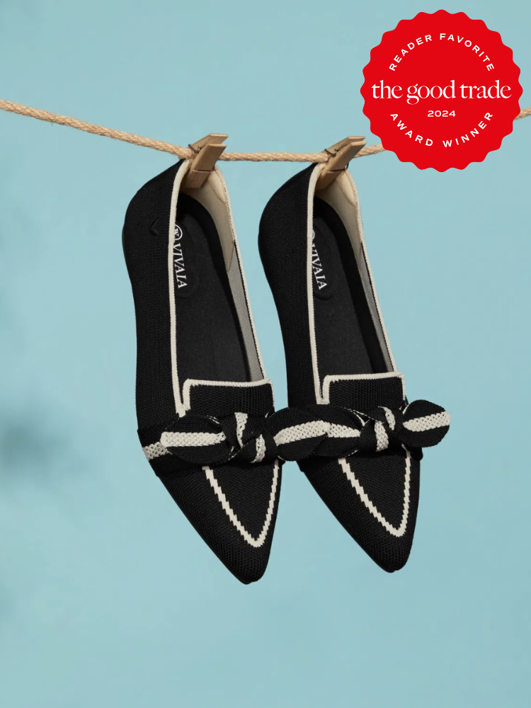 A pair of Vivaia sustainable loafers hanging on a clothesline. The TGT 2024 Award Winner Badge is on the right corner of the image. 