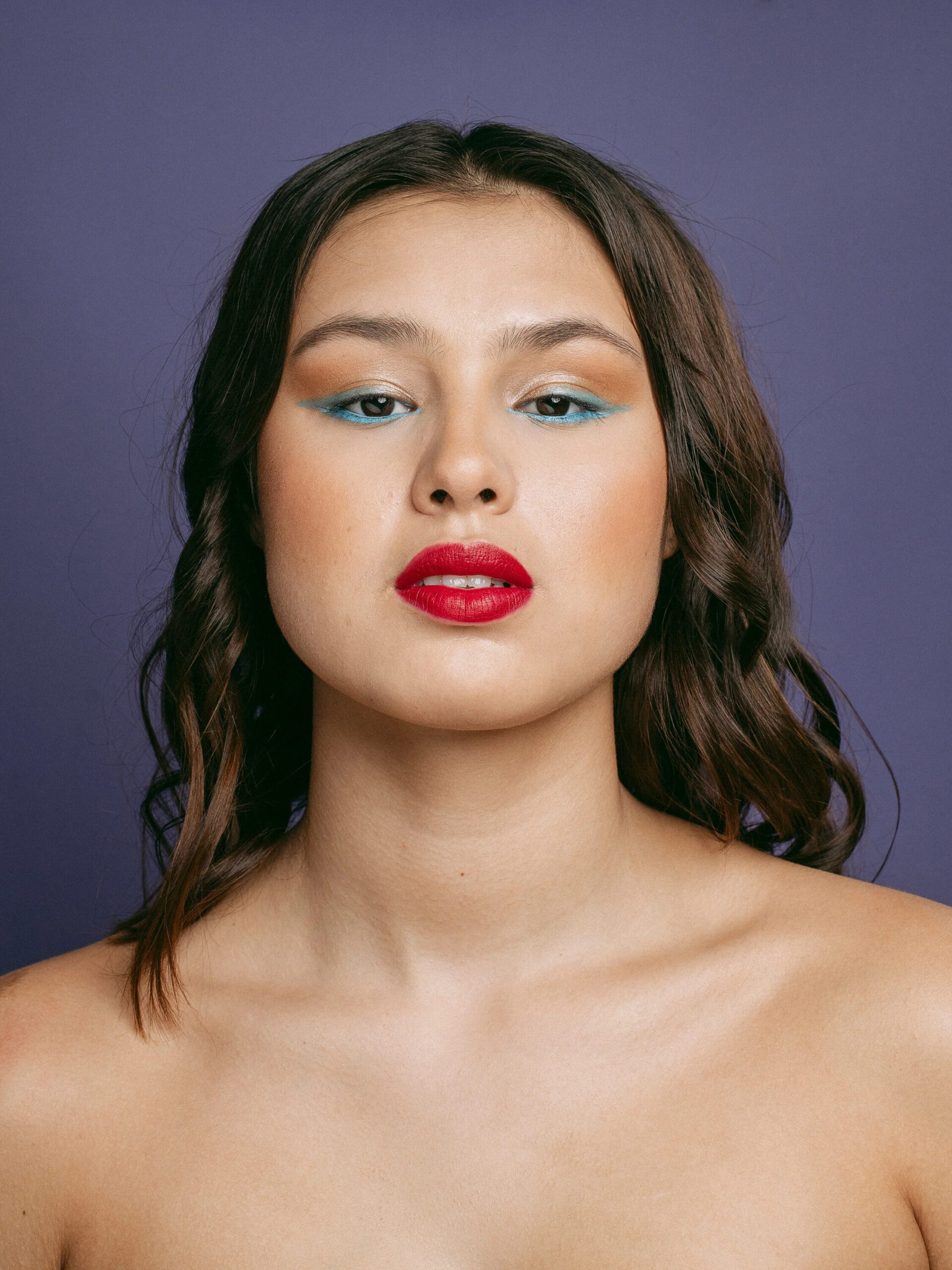 A model wearing Cheekbone Beauty makeup. 