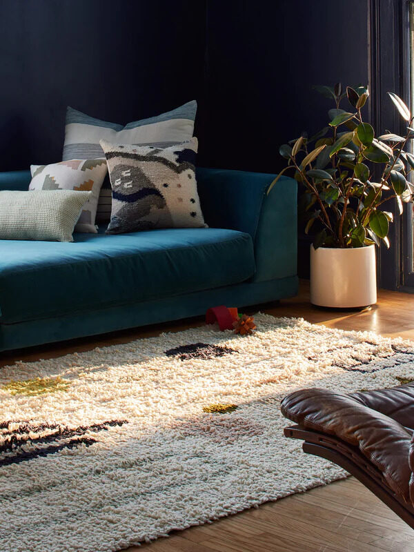 A MINNA rug in a living room.