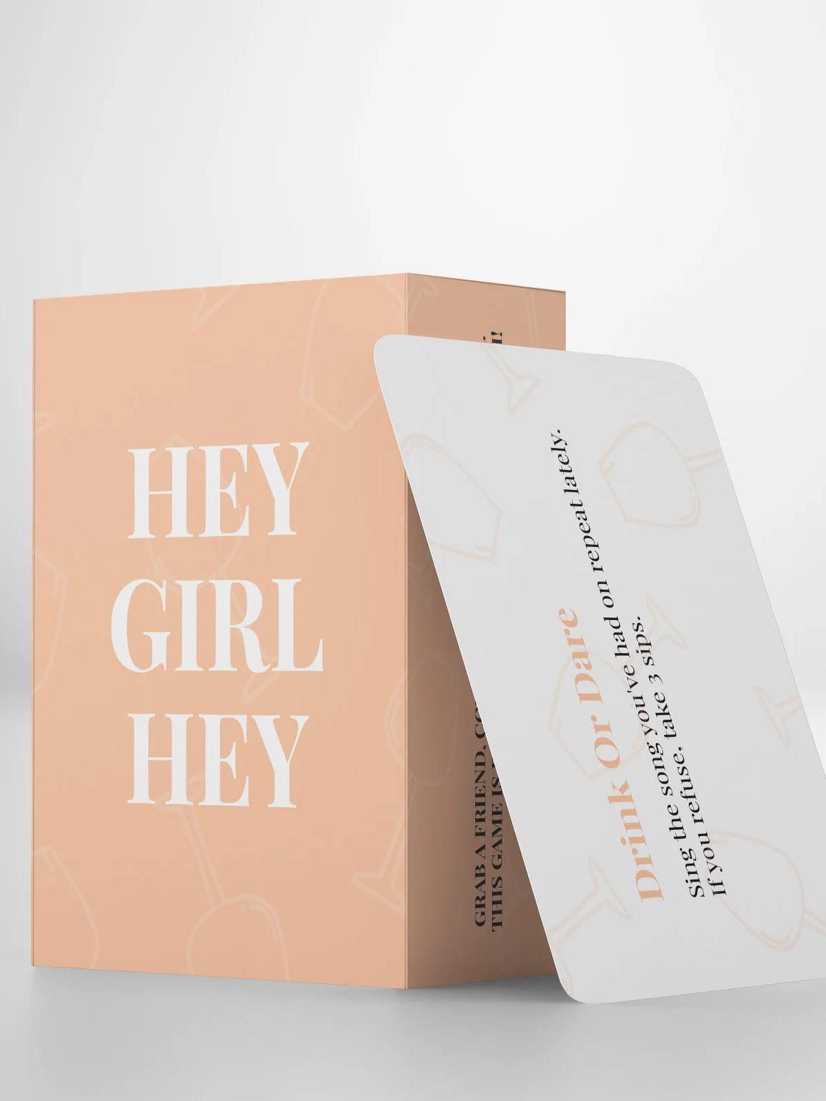 Hey Girl Hey card game packaging with a greeting phrase and playful text on a light background.