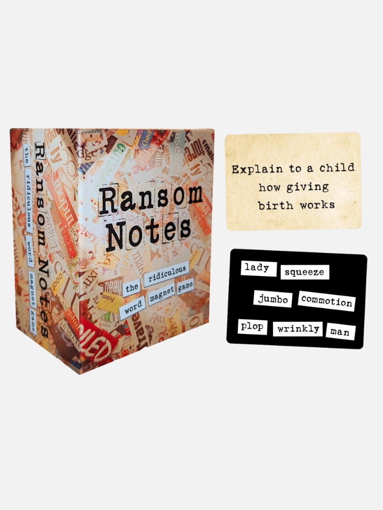 A board game called "ransom notes" with random words on cards displayed next to the box.