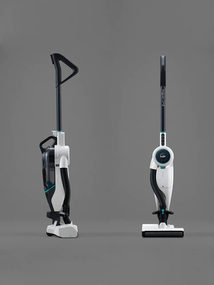 Two modern vacuum cleaners standing side by side against a grey background.