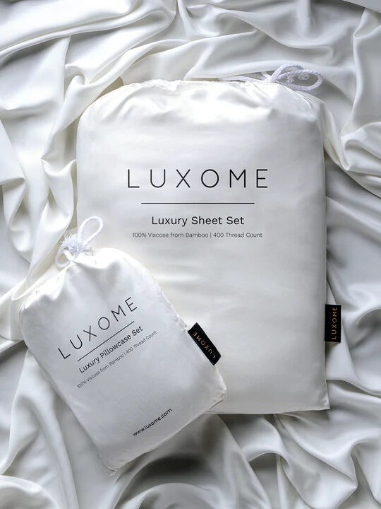 A Luxome carrying bag in white. 