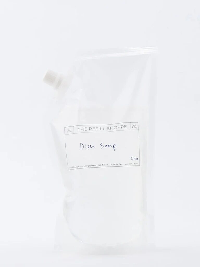 A clear, sealed refill pouch labeled "dish soap" on a white background.