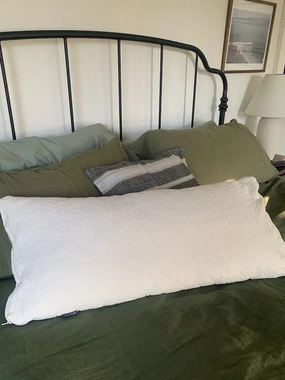 Naturepedic organic pillow on a bed.