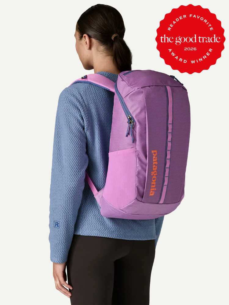 A person wearing a purple Patagonia backpack stands facing away; a red badge in the corner reads “Reader Favorite, The Good Trade Award Winner 2026.”.