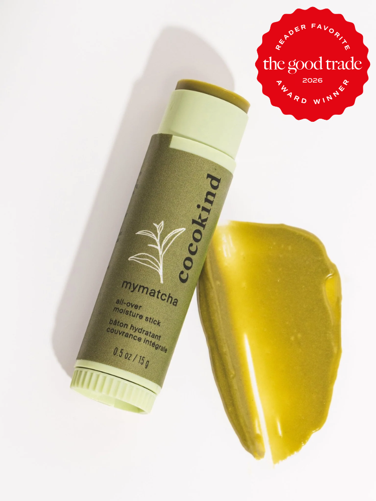 A tube of Cocokind mymatcha all-over moisture stick is shown next to a swatch of the product, with a red "Reader Favorite The Good Trade Award Winner 2026" badge in the corner.