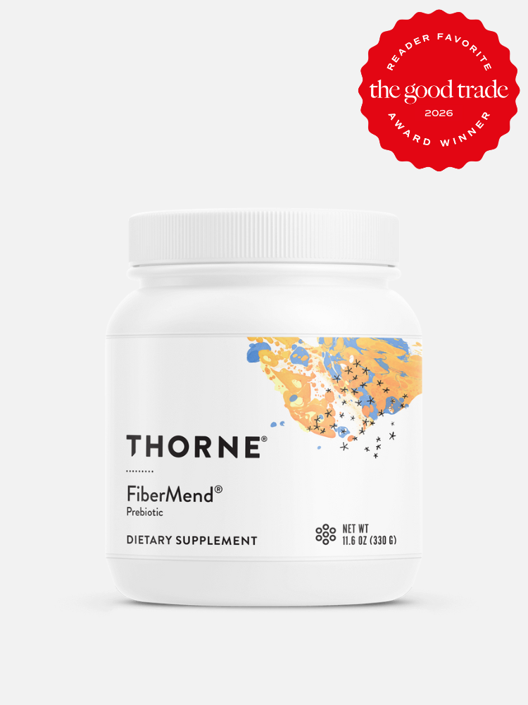 A white container of Thorne FiberMend Prebiotic Dietary Supplement, honored as a 2026 award winner by The Good Trade, stands out among fiber supplements for women with its colorful abstract design.