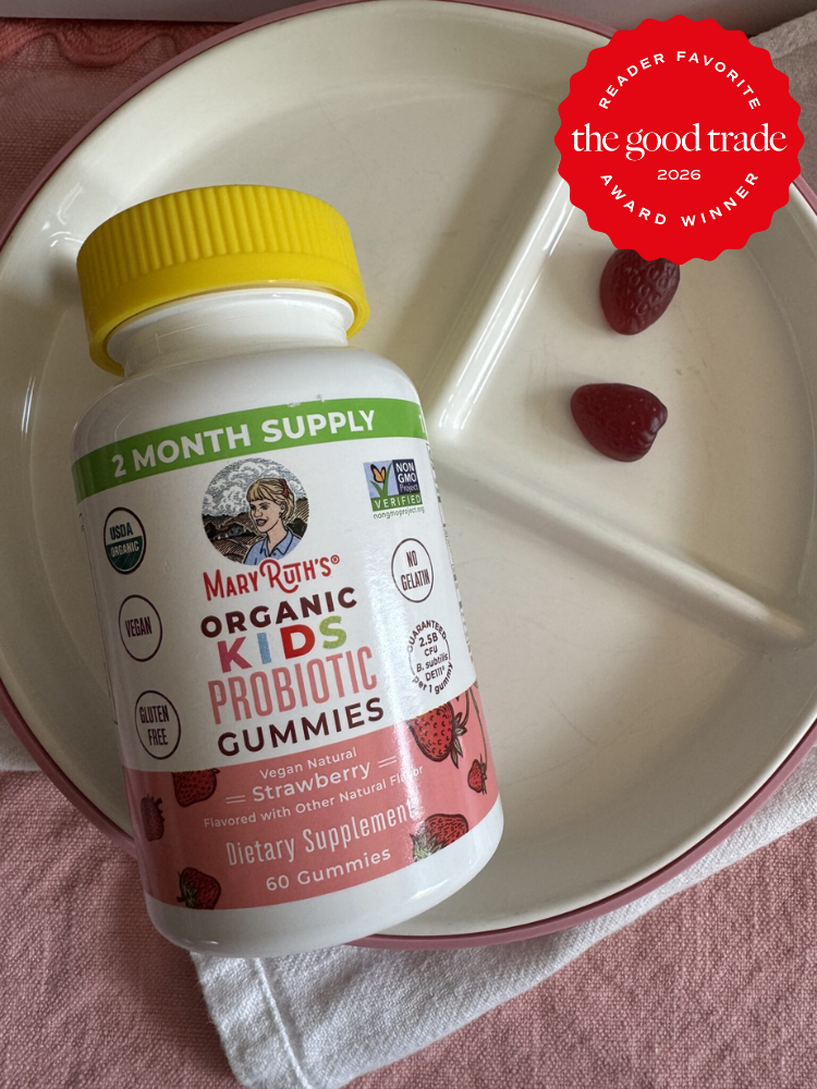 A bottle of MaryRuth’s Organic Kids Probiotic Gummies sits on a white plate with two heart-shaped gummies, next to a red "The Good Trade Reader Favorite 2026 Award Winner" badge.