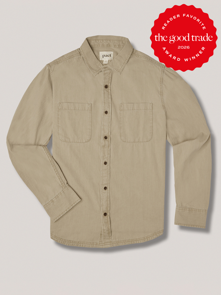 A beige long-sleeve button-up shirt with two chest pockets is displayed. A red badge in the top right corner reads "The Good Trade Award Winner 2026, Reader Favorite.