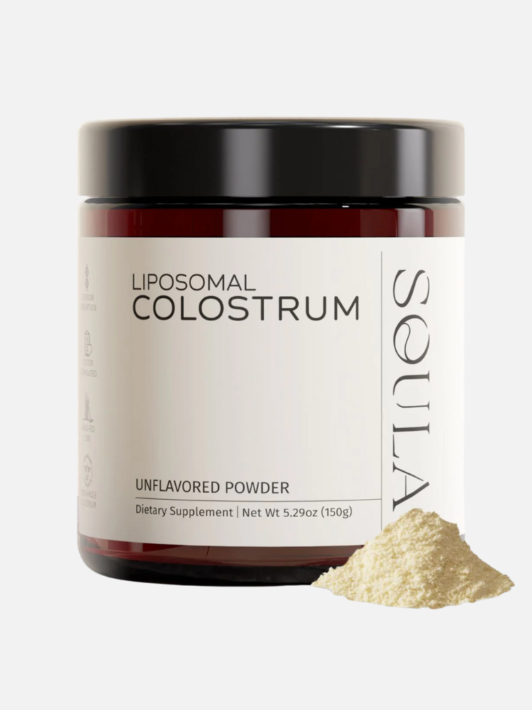 A jar labeled "Liposomal Colostrum Unflavored Powder" dietary supplement with a black lid, shown next to a small mound of the powder.