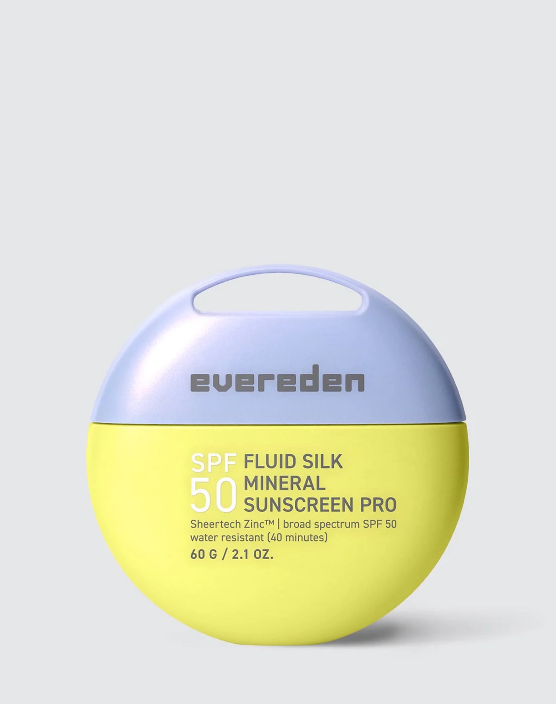 A round, two-toned container labeled "evereden SPF 50 Fluid Silk Mineral Sunscreen Pro" with 60g capacity, designed in pastel purple and yellow with a built-in handle.