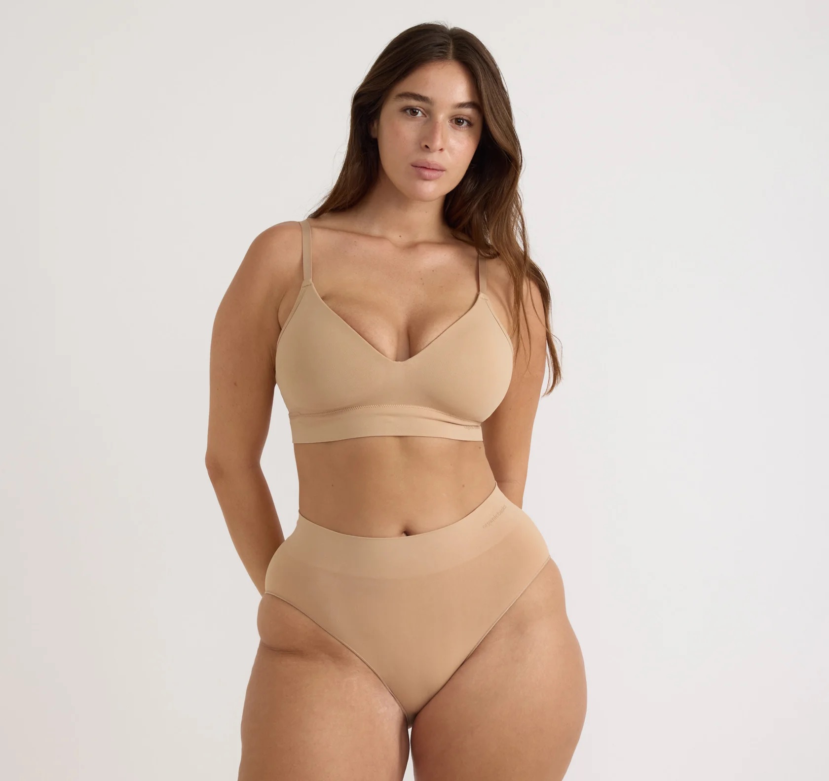 A woman in a beige underwear.