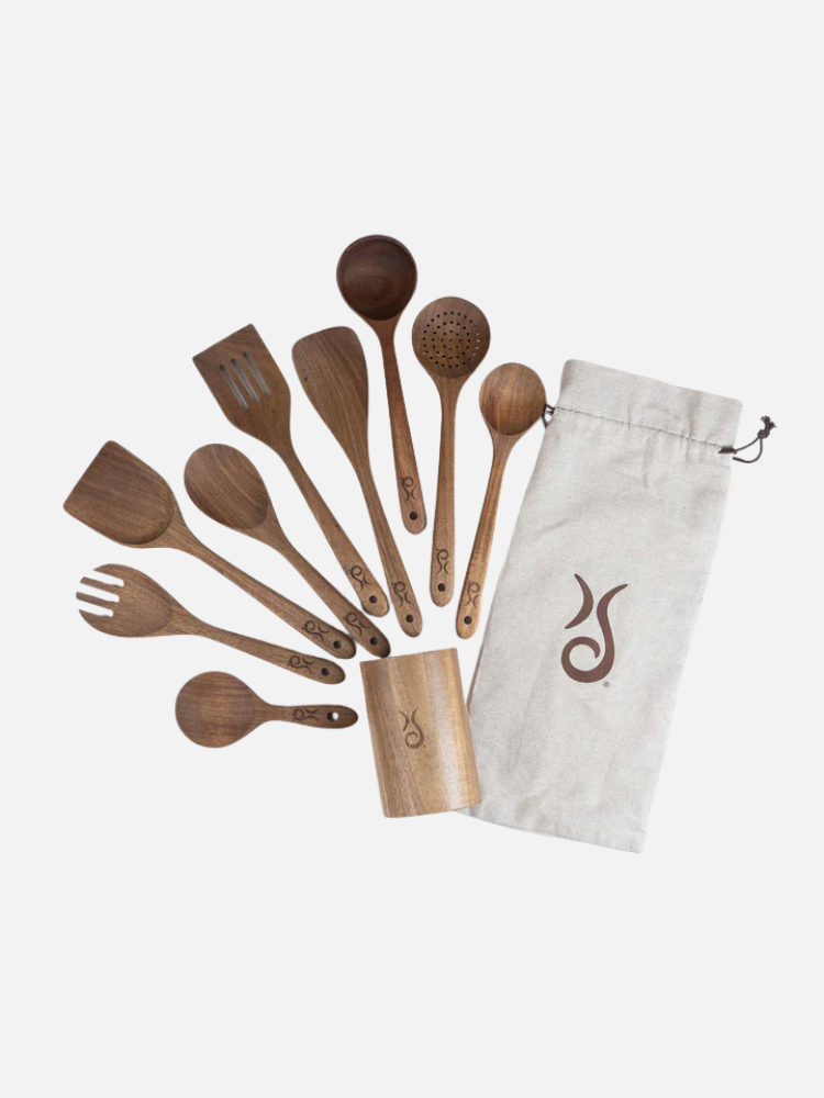 A set of nine wooden kitchen utensils, a utensil holder, and a beige drawstring pouch with a logo, arranged on a white background.