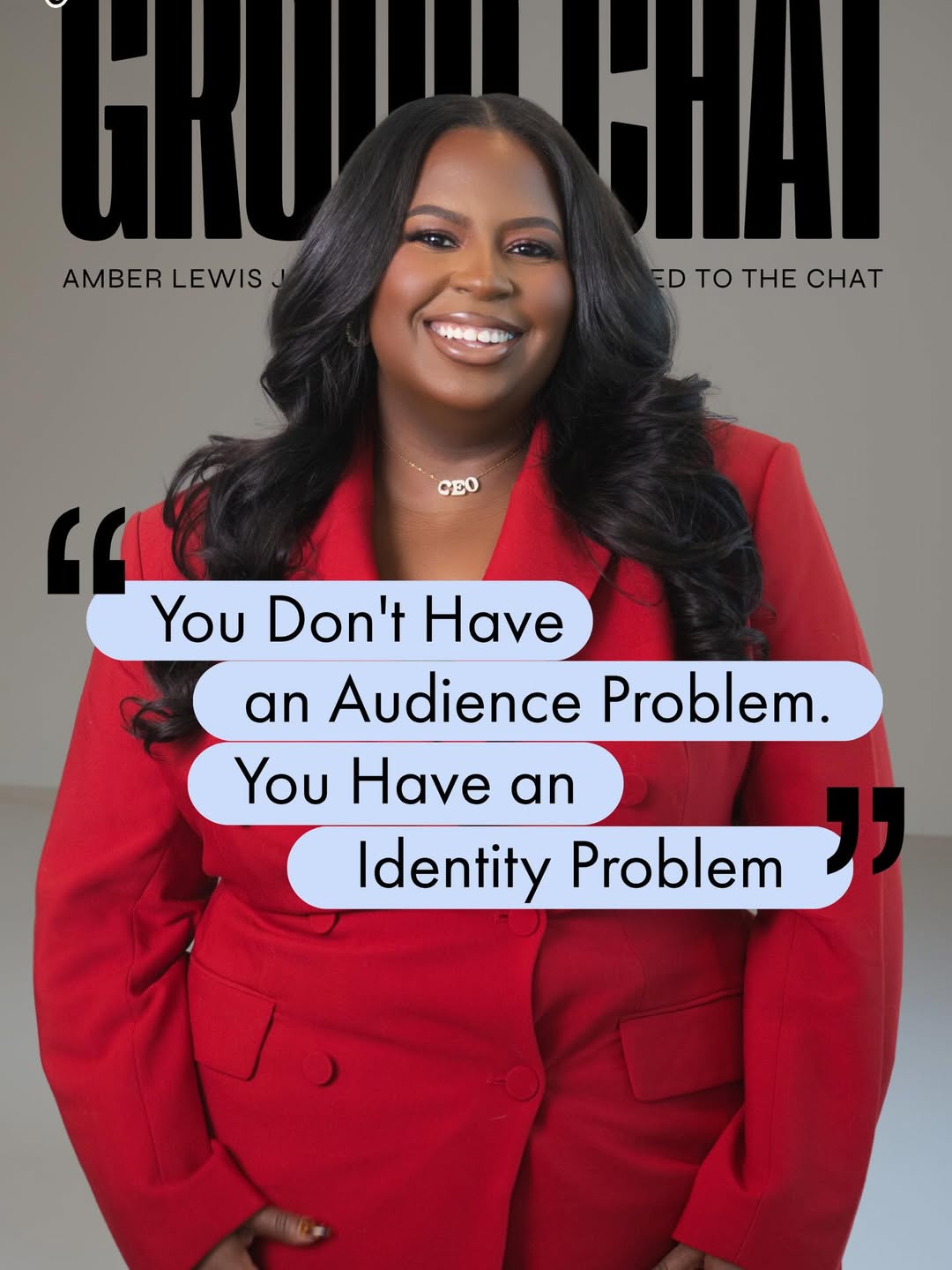A woman in a bright red suit smiles in front of text that reads, “You Don’t Have an Audience Problem. You Have an Identity Problem.”.