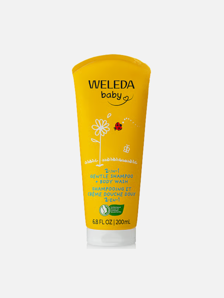 A yellow 200ml tube of Weleda Baby 2-in-1 Gentle Shampoo & Body Wash with simple white and red illustrations on the front.