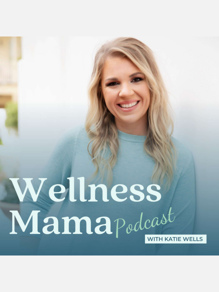A woman with long blonde hair and a light blue sweater smiles at the camera. Text reads: "Wellness Mama Podcast with Katie Wells.