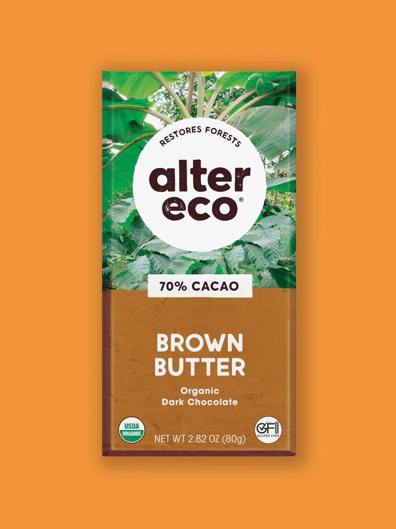 A bar of Alter Eco Brown Butter Organic Dark Chocolate, 70% cacao, with USDA Organic and GFCO Certified Gluten-Free labels, on an orange background.