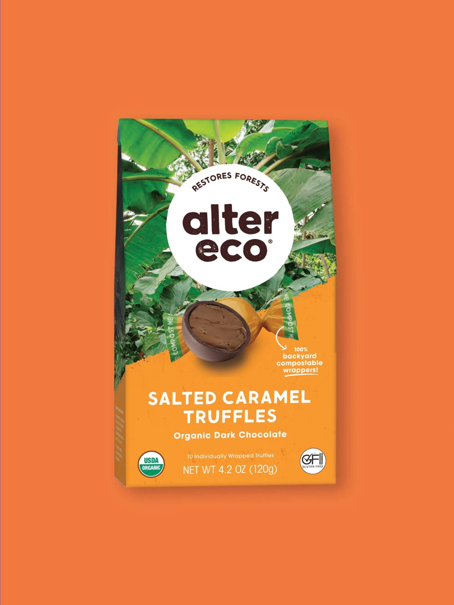A package of Alter Eco Salted Caramel Truffles, organic dark chocolate, on an orange background. The packaging highlights sustainable ingredients and forest restoration.