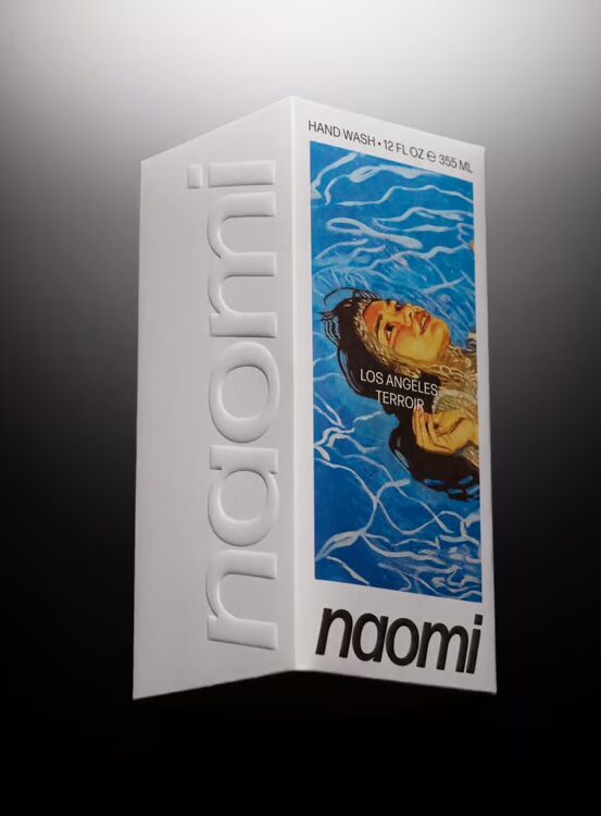 A white rectangular box labeled "naomi" with embossed text, featuring an image of a woman in water and the words "LOS ANGELES TERROR." The box is for hand wash, 12 fl oz (355 ml).