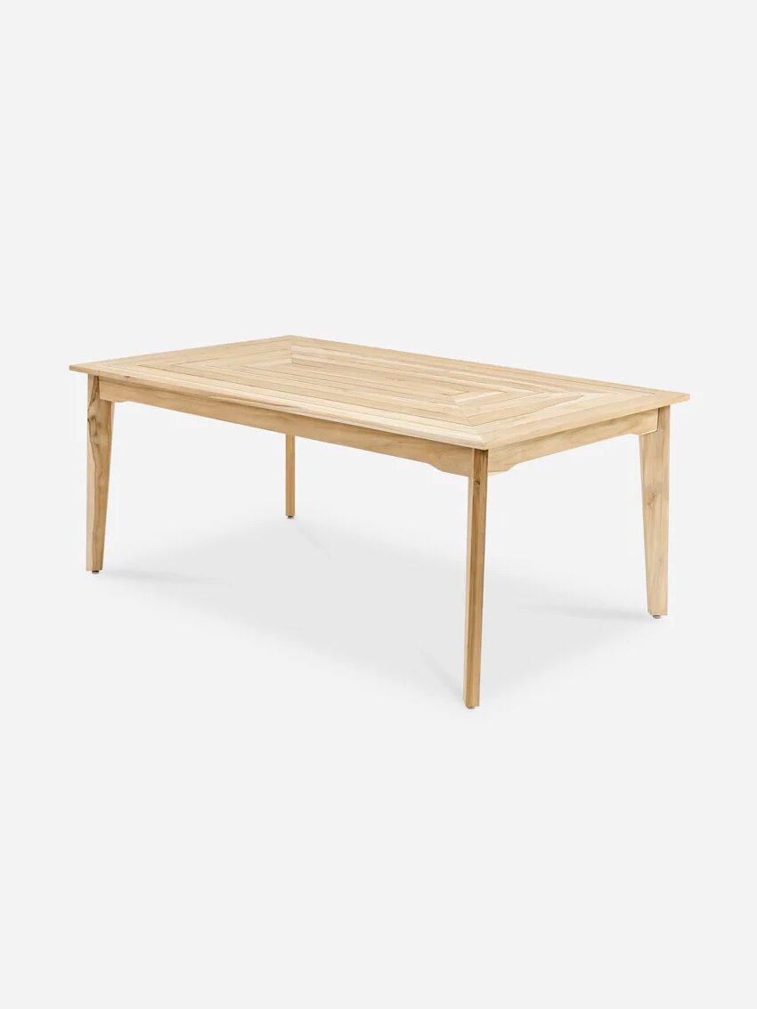 Rectangular wooden table with four legs, natural light wood finish, and a simple, minimalist design, set against a white background.