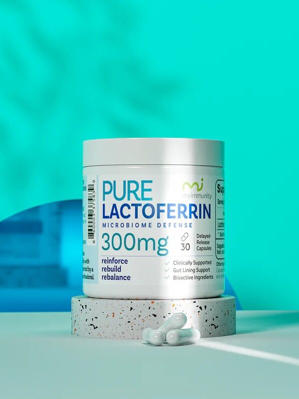A container of Pure Lactoferrin 300mg capsules is displayed on a round platform with three capsules beside it, set against a blue background.