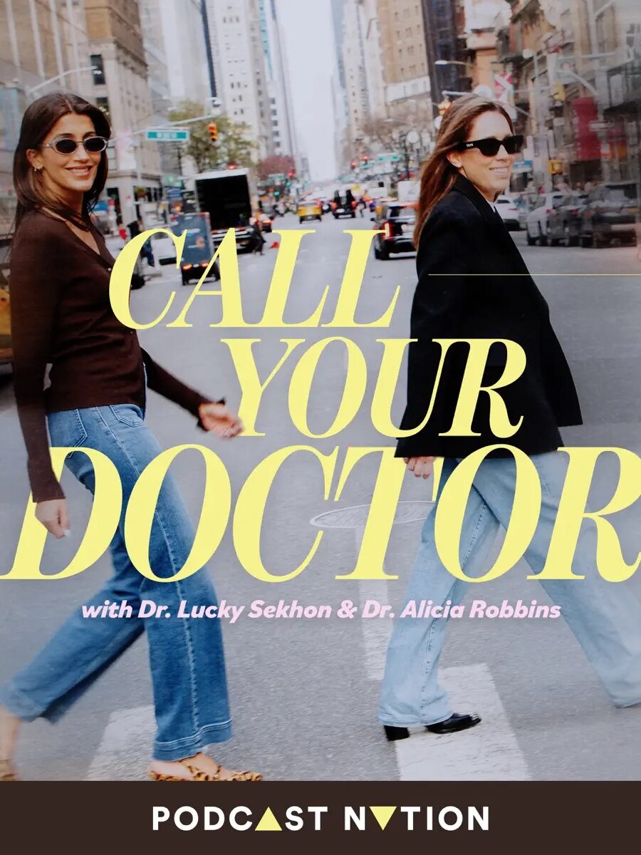 Two women walk across a city street, both wearing sunglasses and casual outfits. The text over the image reads "Call Your Doctor with Dr. Lucky Sekhon & Dr. Alicia Robbins.