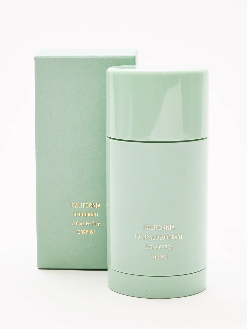 A light green stick of Corpus California Natural Deodorant is shown in front of its matching rectangular box on a plain white background.