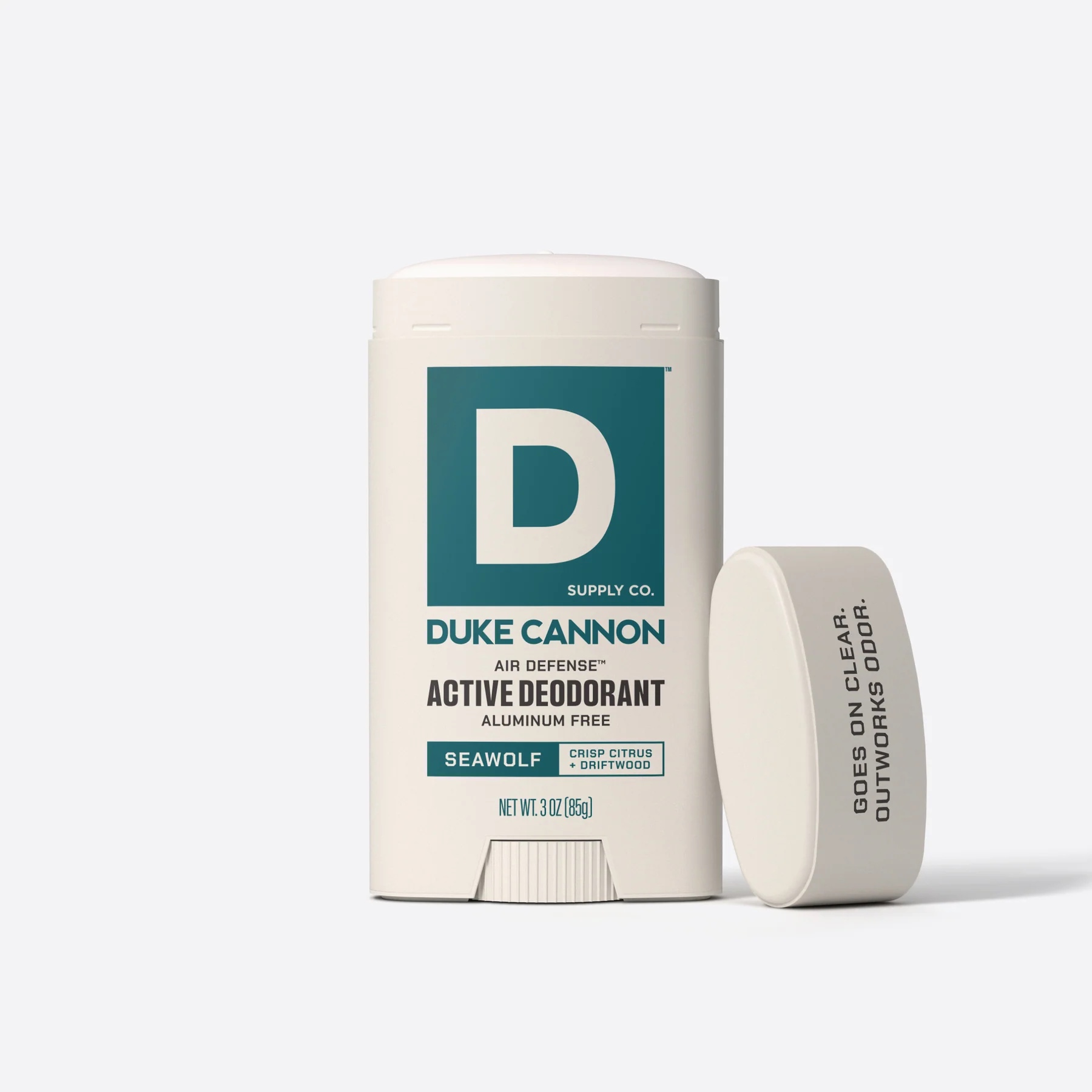 A stick of Duke Cannon Active Deodorant, Seawolf scent, with the cap off and resting nearby on a white background.