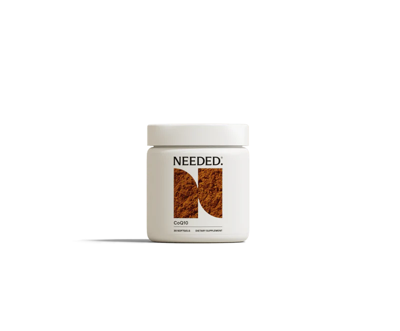 A white jar labeled "NEEDED: CoQ10" contains 60 softgels and is marketed as a dietary supplement. The background is plain white.