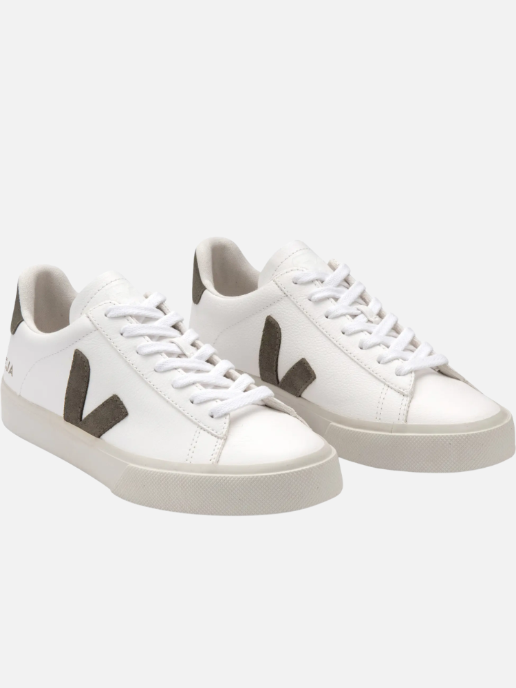 A pair of white low-top sneakers with gray "V" logos on the sides, white laces, and beige soles, set against a light background.