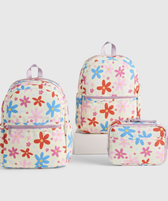 Three bags with a colorful floral pattern: two backpacks of different sizes and a small matching pouch, displayed on a plain background.