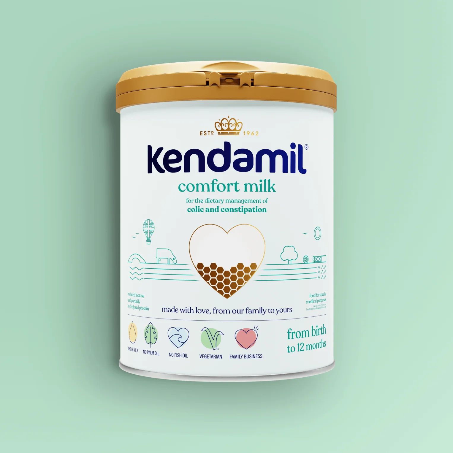 A can of Kendamil Comfort Milk formula for infants, labeled for colic and constipation, with a gold lid and light blue-green background.